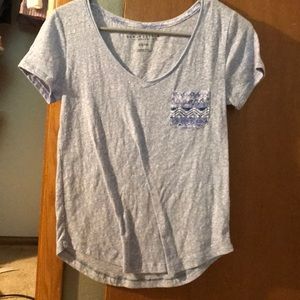 Blue Aeropostale shirt.